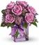 Picture of An Eye-popping fuchsia rose arrangement in a  clear vase (included).