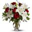 Picture of Flower bouquet with icelandic short stemmed red roses, white lilies and greenery.