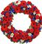 Picture of Fully decorated Funeral Wreath with red, blue and white flowers-3 sizes available.