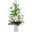 Picture of Modern oriental lily flower arrangement in high vase with tropical leaves.