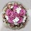 Picture of Romantic Wedding bouquet with lilac and brown roses accented with white baby breath.