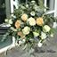Picture of Bohemian wedding bouquet in pastel shades of blush pink, ivory and white.