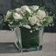 Picture of An elegant  white roses, baby breath, eucalypthus -flower arrangement in vase.