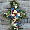 Picture of Beautifuly decorated Funeral Cross with white, red, blue flowers, berries and more