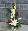 Picture of Flower arrangement with white gladiola, white lilies, baby breath and more.