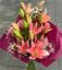 Picture of Elegant Icelandic aziatum lilies in a bed of baby's breath.
