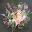 Picture of Bohemian wedding bouquet in autumn pastel shades of blush pink, ivory and peach..