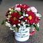 Picture of Florist choice-lovely arrangement with mixed flowers in coffee cup.