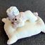 Picture of Soft and cute teddy bear girl on a pillow