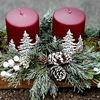 Picture of Beautiful advent arrangement in light wood tray with artificial greenery and wine red painted candles..