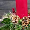 Picture of Gorgeous Christmas arrangement with red pillar candle