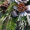Picture of Tall Christmas candle arrangement in beautiful tall vase